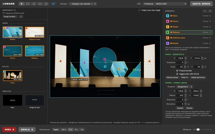 Lumask window: a theatre stage mapped with free shapes, each one playing its own video source